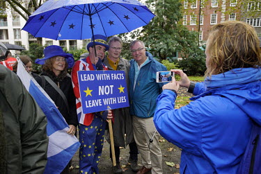 Anti-Brexit campaigner Steve Bray meets other activists on the 'Rally for Our Rights' march, hastily organised by campaigners after the 'People's Vote March' was changed to 19 October.