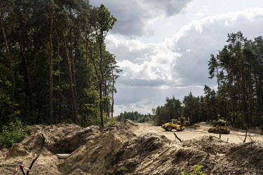 Construction machines prepare the ground for the 'Via Carpathia' expressway, a multi-lane road that will link the Baltic States, eastern Poland, Slovakia and Romania.