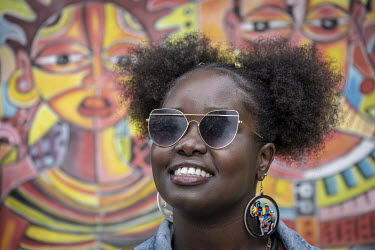 A woman who has had her hair styled for 'Hairitage Chronicles. A festival for the Natural Hair Community'.