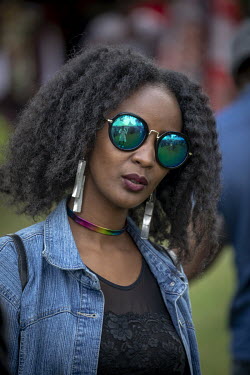 A woman who has had her hair styled for 'Hairitage Chronicles. A festival for the Natural Hair Community'.