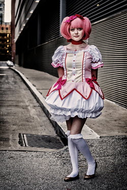A woman at a Cosplay Tekko event in character as: Madoka.
