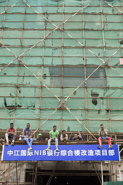 Labourers during a break at a Chinese-owned construction project.