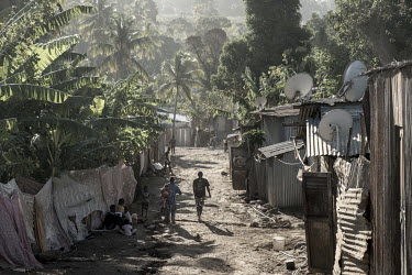 A pathway running through a slum district comprised of 'bangas' (a shack made with corrugated zinc sheets) near Majicavo Koropa.