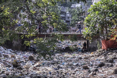 Rubbish clogs a riverbed running through Mutsamudu.