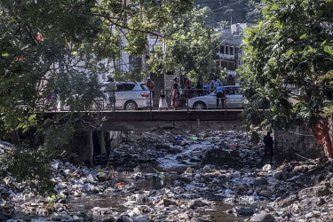 Rubbish clogs a riverbed running through Mutsamudu.