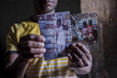 Zankidine Said Ali (33) displays photos of his brother Abene Said Ali, who died trying to reach Mayotte in 2013 at the age of 29. Abene had been deported twice, and was attempting to travel back to Ma...
