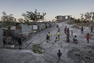 Comorian migrants children mill about in an open space in a slum community near Majicavo Koropa.