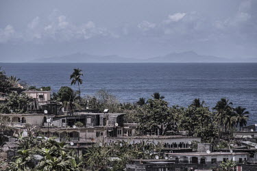 The French island of Mayotte seen from above the town of Domoni on the island of Anjouan. The two are separated by just 60km of sea, yet living standards are vastly different.
