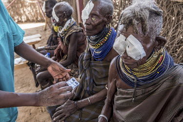 Patients rest after receiving trachoma surgery at a rural clinic in a remote area of Turkana.