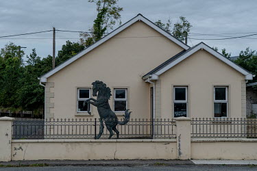 An ornamental horse outside a house near the UK/Ireland border.