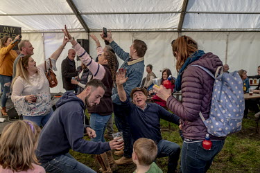 Young and old dance to local music at the Alwinton Border Shepherds' Show. First begun in 1866 when shepherds brought down stray sheep from the moors and redistributed them amongst their owners, the s...