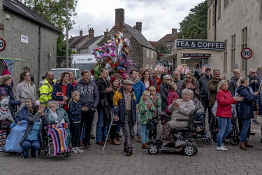 People gather to watch the celebrations at the Shaftesbury Carnival. Every autumn, in the run up to Guy Fawkes night, towns and villages in the county of Somerset compete in a series of illuminated c...