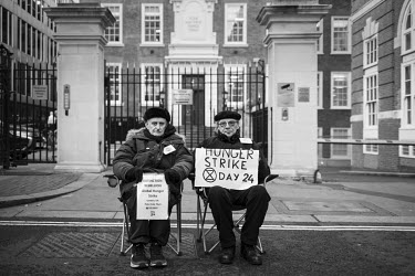 Professor Peter Cole (76), a retired respiratory doctor and Marko (right) on day 24 of their hunger strike for Extinction Rebellion's three demands, outside Conservative Party HQ.