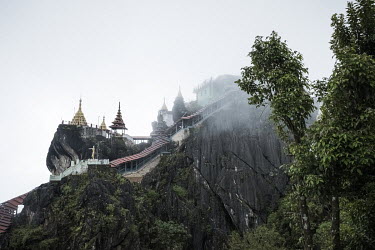 The Kyauk Pyat Thut Pagoda (Kyauk-Pyat-That), a Buddhist monastery perched high on a mountainous rock.