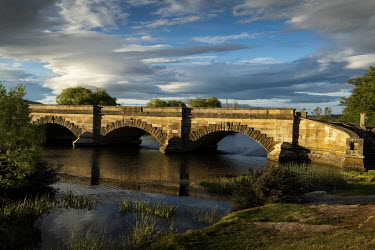 Ross Bridge, completed in July 1836, which crosses the Macquarie River. The sandstone bridge was constructed by convict labour, and is the third oldest bridge still in use in Australia.