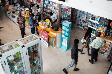 Customers in Yem-bla Pharmacy in Lome.