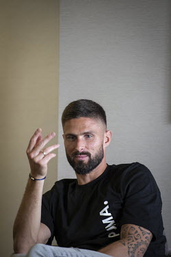 French footballer, Olivier Giroud, who plays for the Premier League club Chelsea and the France national team, talking about his Christian faith to French journalists, in the Chelsea Harbour Hotel.