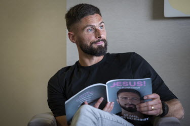 French footballer, Olivier Giroud, who plays for the Premier League club Chelsea and the France national team, talking about his Christian faith to French journalists, in the Chelsea Harbour Hotel.