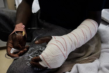 The bandaged arm of Qiniso Sihlonganyane (36) at RFM Hospital. He had been bitten on the hand by a Mozambique spitting cobra while asleep at his home in Nhlambanyane, and required surgery to remove ne...
