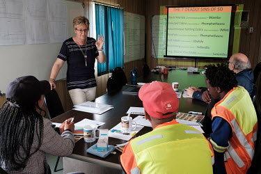 Thea Litschka-Koen delivering a snakebite first aid and snake handling course to road construction company staff in the Lubombo Region.Thea Litschka-Koen's involvement with snakes began after one of h...