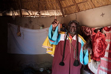 Prophet Robert Malambe, a faith healer, in the room where he sees clients at his home in Lomahasha in the Lubombo Region. He claims he can heal snakebite victims with prayer and traditional medicine m...