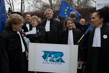 Visiting Dutch and other EU nation's judges outside the Polish Supreme Court where they are attending the so-called 'March of a thousand robes', in support of Polish judges who are fighting a proposed...