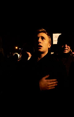 A man sings the Czech national anthem during a rally demanding the resignation of Czech Prime Minister Andrej Babis.