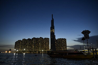 Landmark 81, a high rise residential tower illuminated at night in the city centre.