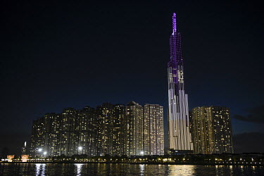 Landmark 81, a high rise residential tower illuminated at night in the city centre.