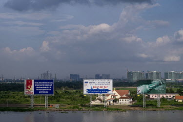 Advertising alongside a river in the district of Thu Thiem.