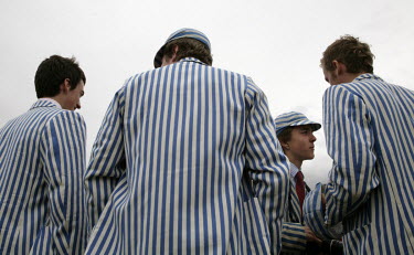 The Eton College 2nd eight rowing team, at the Henley Regatta, an annual festival of rowing races held on the River Thames.