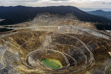 An overview of the open pit at the Amman Minerals Batu Hijau mining concession.