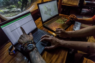 Joe Micalizzi (left) and Eric Corpuz, former US military analysts and members of the intelligence services, working as analysts for 'tenBoma'. At the Serena Hotel in Amboseli National Park, they consu...