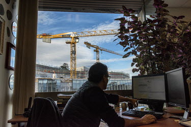 United Nations Office Geneva, Strategic Heritage Plan View of the new building under construction from a staff area of UNCTAD, on a higher floor of Building E, which dates from 1973 and whose upper 7...