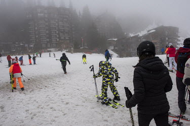 Climate change impact on the ski industry. Skiers at the high level ski resort of Avoriaz, which at 1800 metres is less exposed to lack of snow than many other resorts although even there, roughly hal...
