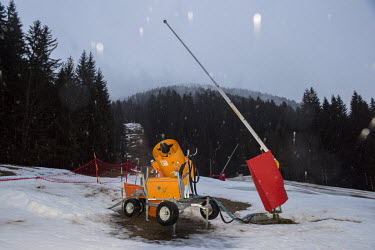 A snow cannon and a lance, both used for making snow, on a lower slope at the ski resort of Avoriaz. Despite being less exposed than many other resorts to a lack of snow, nearly 50% of snow on this hi...