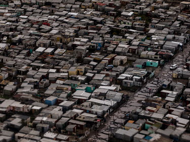 A densely packed area of slum housing in a Cape Town township. According to the World Bank figures, South Africa is by far the most unequal country in the world measured by the so-called Gini coeffici...