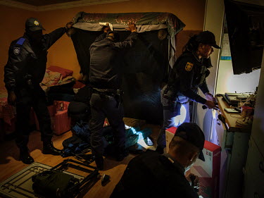 The newly formed police unit the Neighbourhood Safety Team (NST) search in a property after they received information from The State Police (SAPS) that drugs and weapons were being kept at the address...