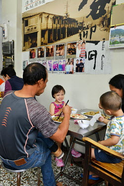 A family dine at the popular Ching Hsiang Restaurant, known for its Hakka Cuisine.