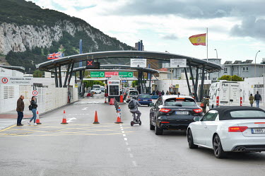 Cars aproach the Gibraltar border crossing from the Spanish side.