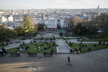 A busy park over looking the city.  In response to the growing threat of the COVID-19 Coronavirus, President Macron announced on 12 March 2020, the closure of all schools across France and measures to...