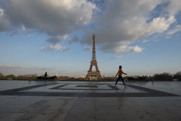 Iconic landmarks such as the Eiffel Tower, normally teaming with tourists and visitors, are nearly deserted. In response to the global spread of the novel COVID-19 virus, the French government has imp...