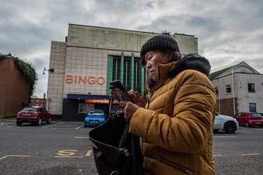 A woman passes a bingo hall housed in former cinema in the old Fenland market town of Spalding.  In the 2016 referendum on Britain's membership of the EU, the South Holland district produced the secon...