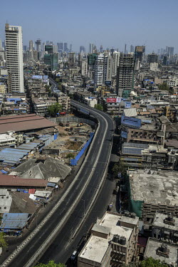 A multi-lane road, running through the heart of the city, is deserted following the imposition of a curfew ordering people to stay in their homes as the authorities try to stem the spread of coronavir...