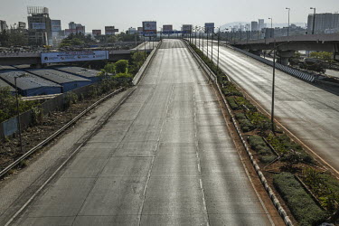 A deserted multi-lane road following the imposition of a curfew ordering people to stay in their homes as the authorities try to stem the spread of coronavirus.