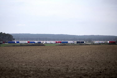 Trucks queue along the A12 motorway leading to the border between Germany and Poland. As coronavirus control measures are put in place at borders traffic crossing from Germany to Poland has built up a...