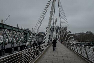 The Golden Jubilee pedestrian bridge, deserted as people stayed away in response to government recommendations introduced to try and slow the spread of coronavirus.