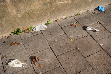 Discarded face masks and rubber gloves on the ground near the Brugmann University Hospital.  Following the spread of the coronavirus around many European countries, people have started wearing face ma...