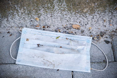 A discarded face mask on the ground near the Brugmann University Hospital.  Following the spread of the coronavirus around many European countries, people have started wearing face masks and rubber gl...
