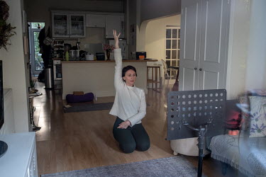 Arjeta Grapci, a yoga teacher, gives an online class to clients from around the world. She started the online lessons as a result of the coronavirus lockdown and has built a client base in the UK, Gre...